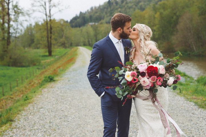 Wedding portrait with large spring bouquet