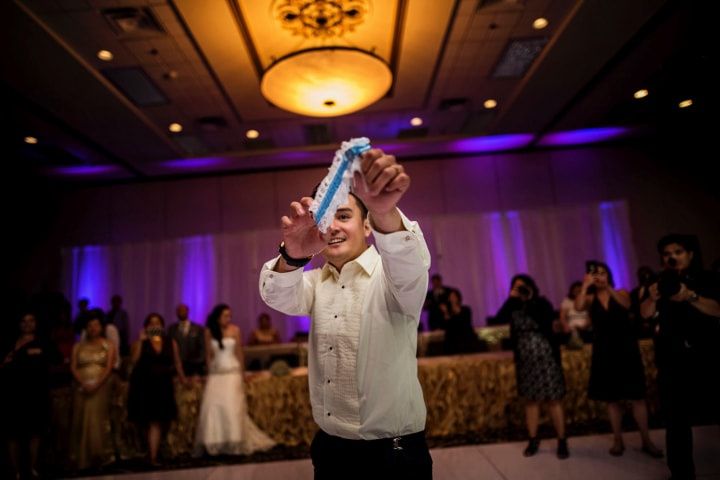 Indian wedding garter toss.   @kismeteventsinc