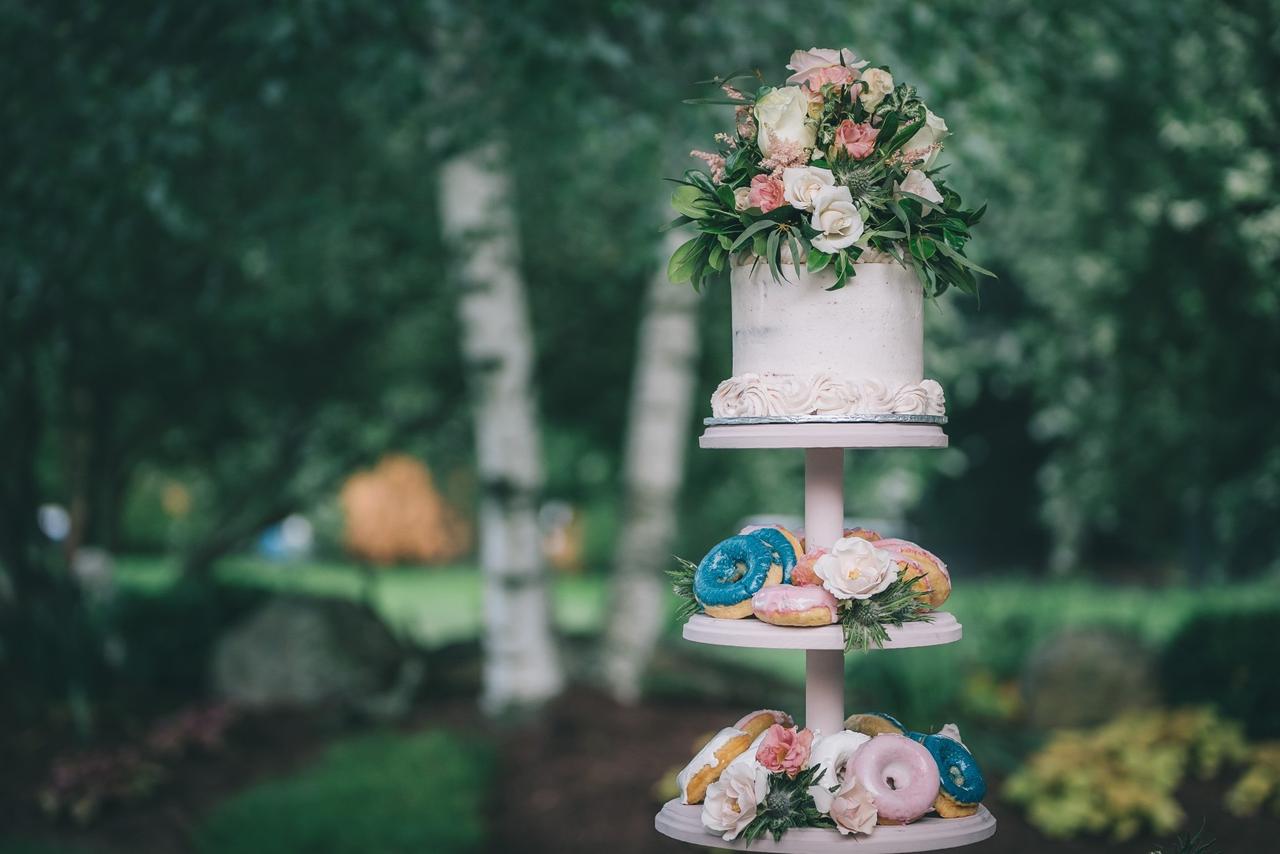 Donuts on tiered cake stand at wedding