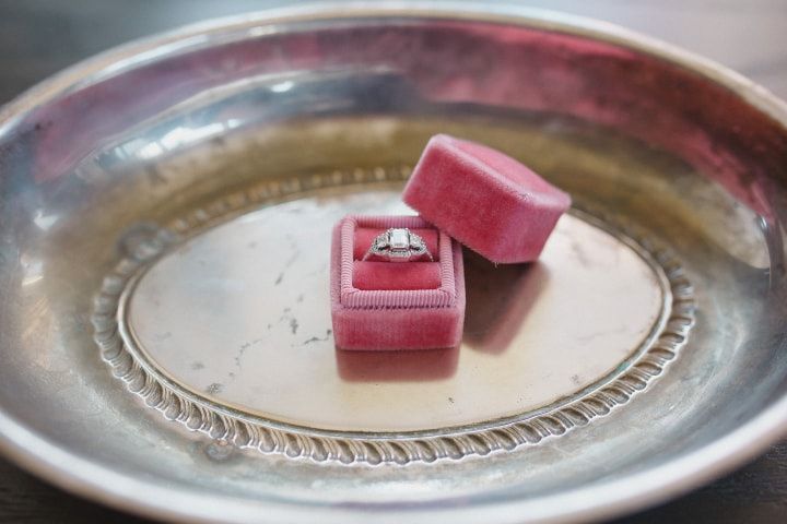 Engagement ring in a pink velvet ring box
