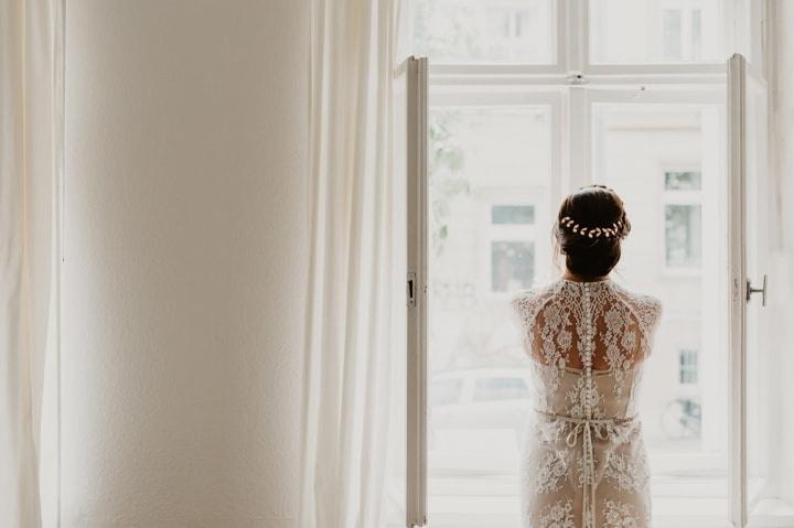 Bridal portrait at the window