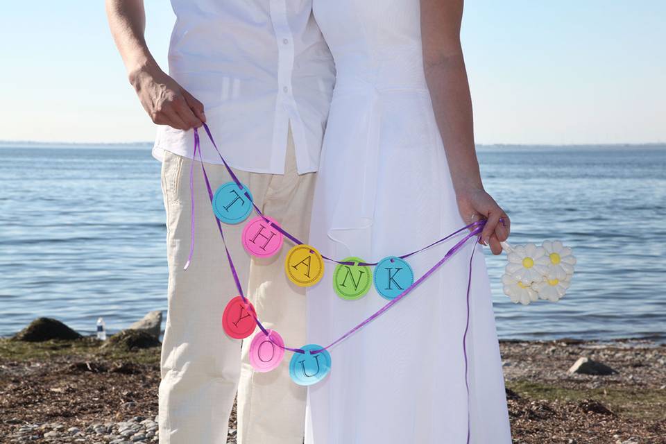 Wedding portrait with thank you banner