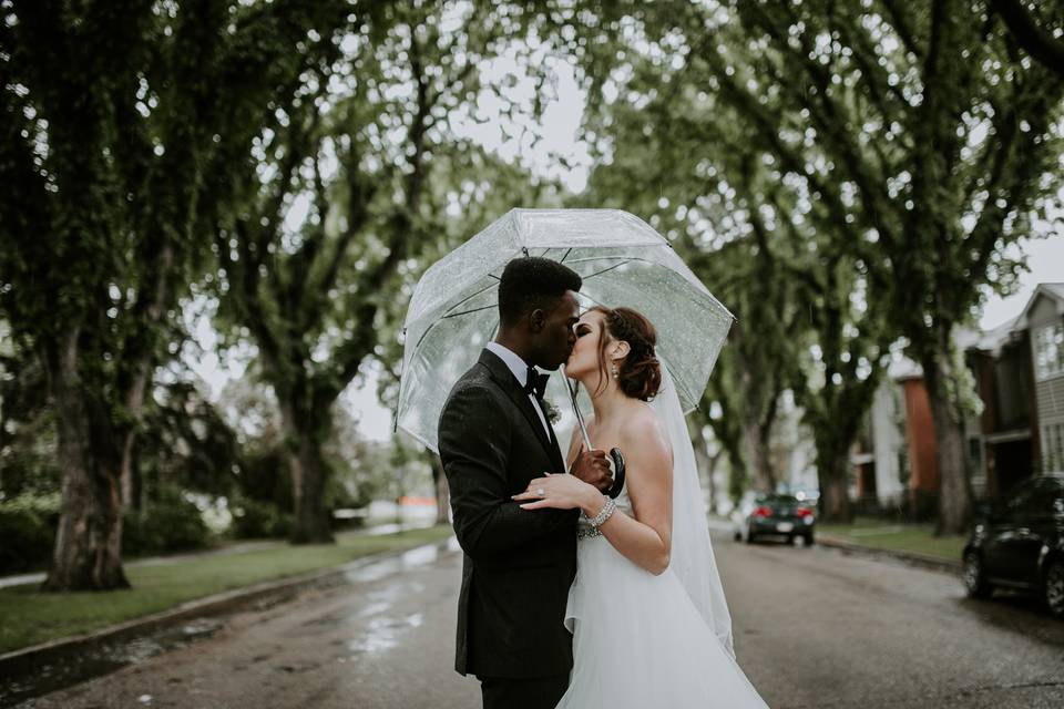 Wedding portrait in the rain