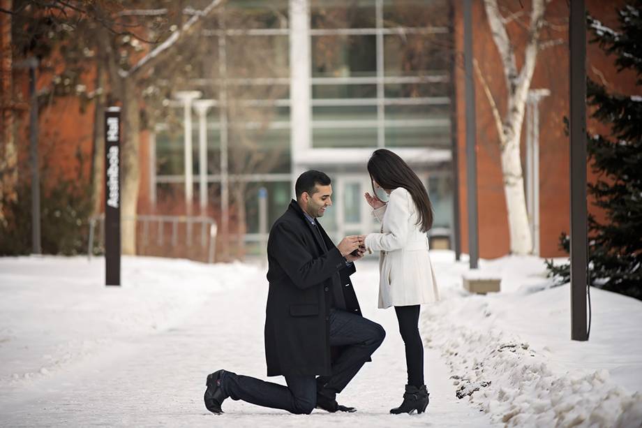 Marriage proposal down on one knee in the snow
