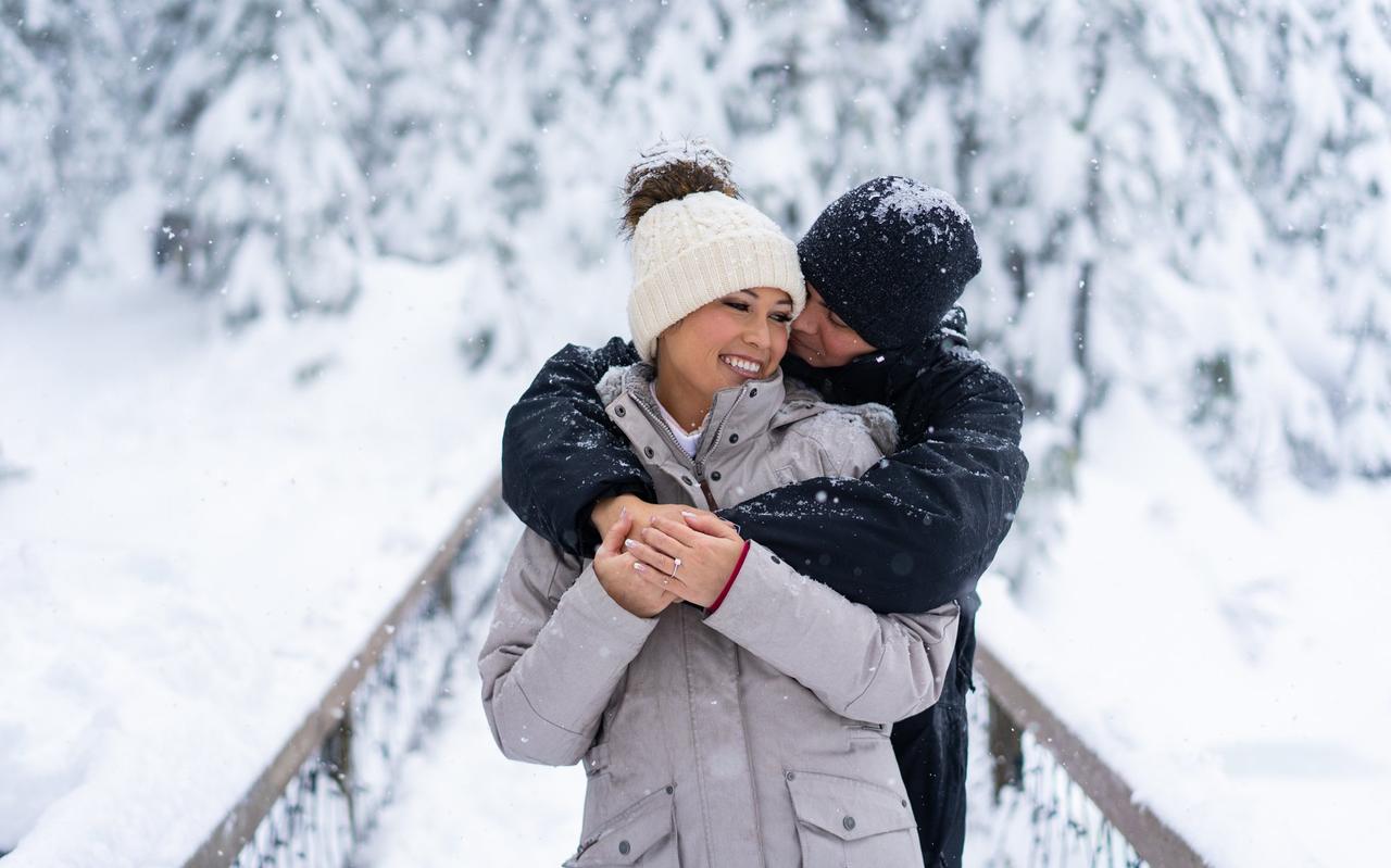 Young couple hugging and kissing on a snowy winter park near of a many big  trees full of snow. Concept of joint rest. Winter Photography 2021 Stock  Photo - Alamy