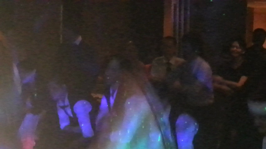 The hotel staff joins in on the dance floor