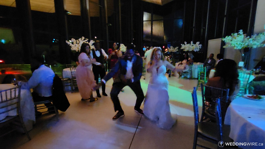 Bride having fun with Guests at Spencer's by the Waterfront