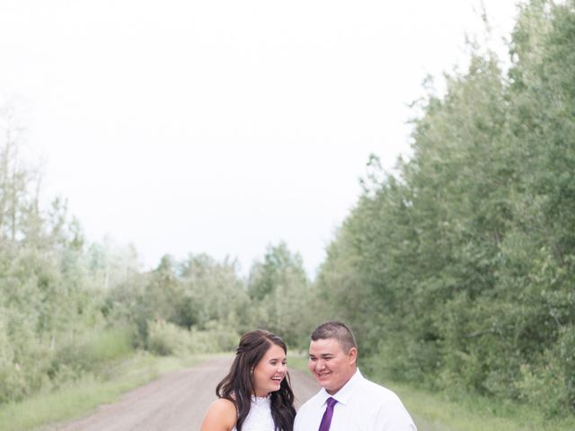 Dusty and Isa&apos;s wedding in Fort St John, British Columbia 31