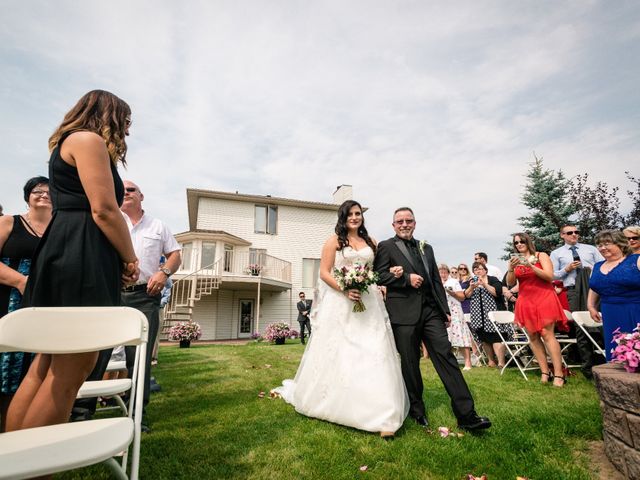 Sheldon and Ashten&apos;s wedding in Sylvan Lake, Alberta 33