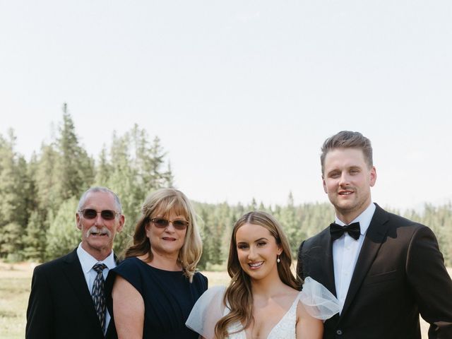 Justin by Megan and Madi&apos;s wedding in Canmore, Alberta 17