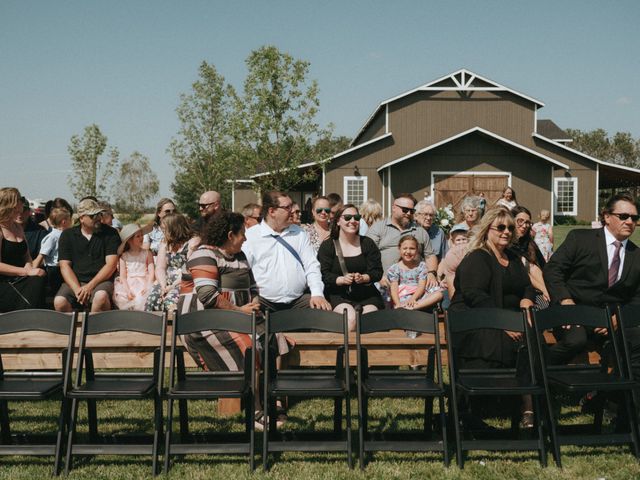 Tysen by Rachel and Tara&apos;s wedding in Lacombe, Alberta 16