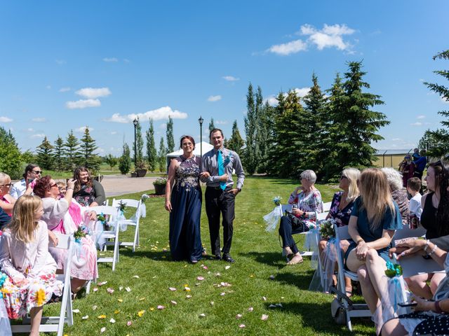 Ashlee and Grayden&apos;s wedding in Olds, Alberta 33