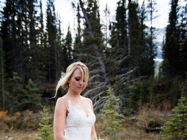 Riley Frame and Kimberly White&apos;s wedding in Canmore, Alberta 31