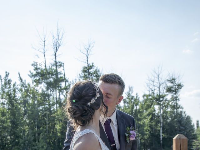 Caleb and Cassandra's wedding in Bentley, Alberta 17