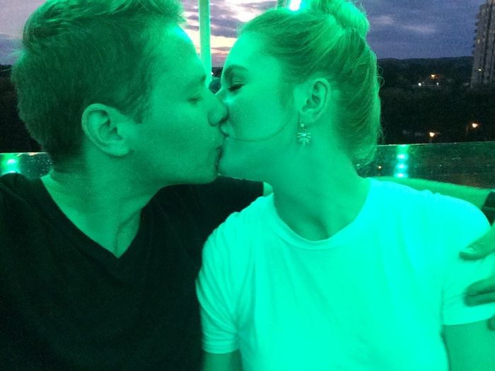 Kissing on a ferris wheel 