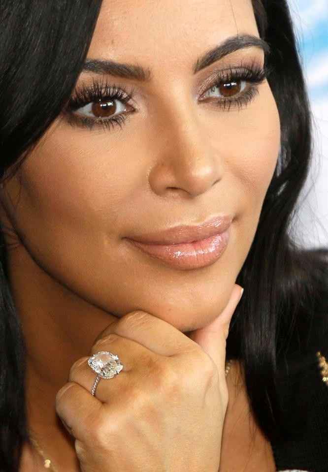 D) Forget about the wedding!  It's all about the ring!  I'll take a 15K diamond like Kim K