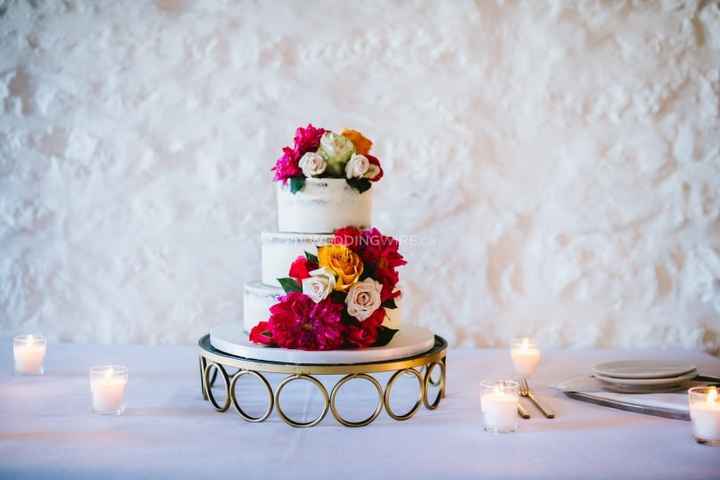 Bright fresh flowers as cake decorations
