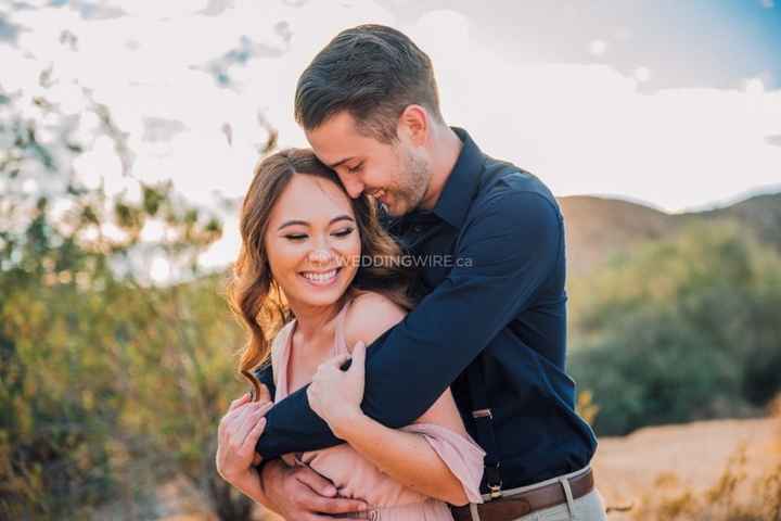 Engagement Photo - Laughing Cuddling Couple