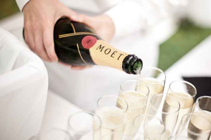 Pouring Moet champagne for champagne toast