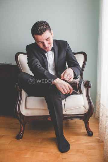 Groom Putting On Shoes
