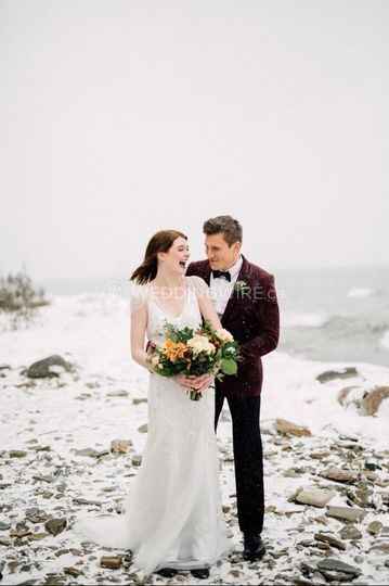 Laughing Bride and Groom in the Snow
