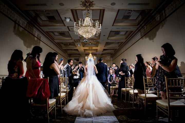 Bride Walking Down The Aisle In Big Tulle Ballgown
