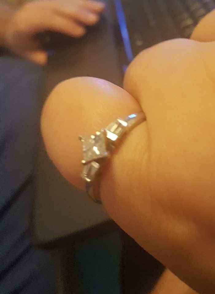 My ring and I love it!  Custom design, we turned the middle stone to be facing north and south.  It 