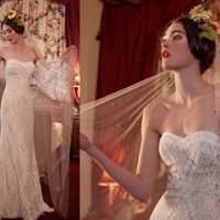 Veil with red pom poms