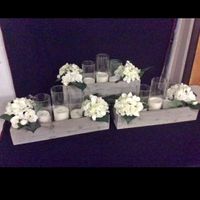 My beautiful center pieces. I will be adding in some colour to the flowers.