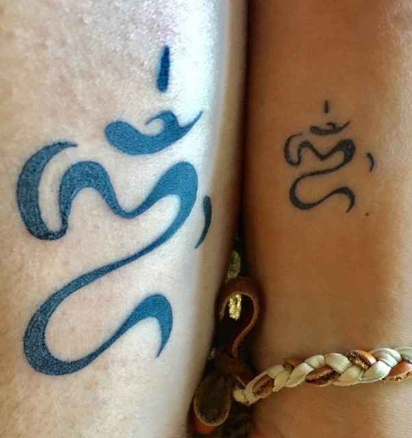 We got matching Bali Om Swastiatu tattoo
