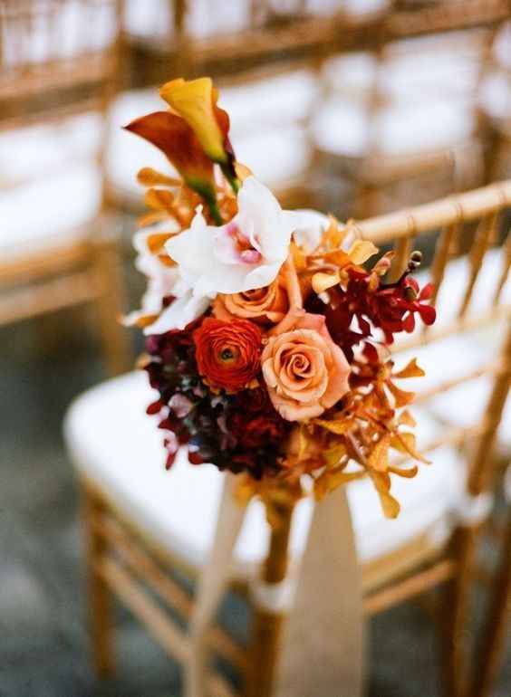 fall ceremony decoration flower pew ends orange red