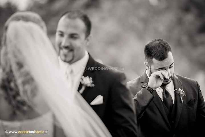 couple at ceremony best man crying happy