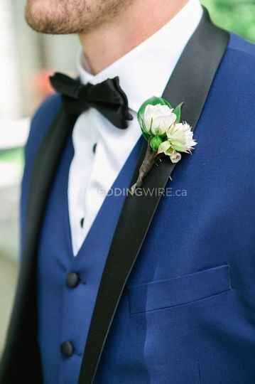 navy tux with black lapel and bowtie