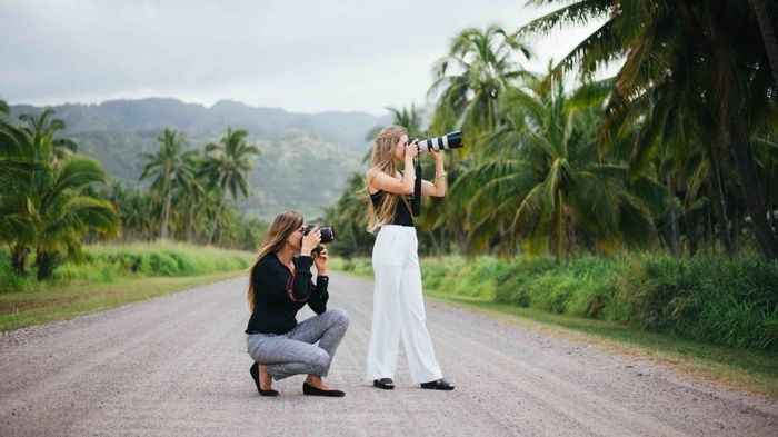 two photographers on a wedding day