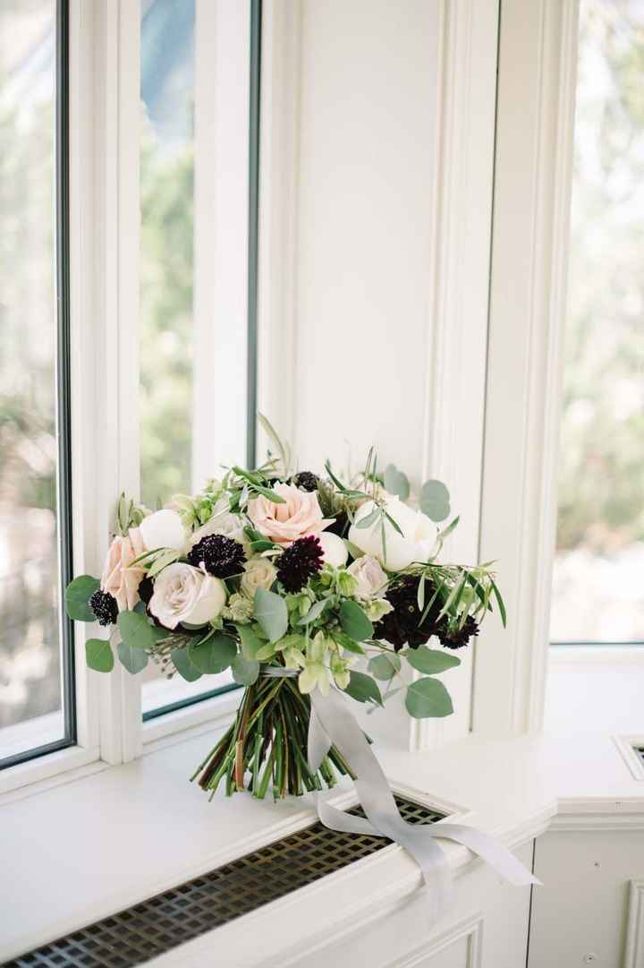 bridal bouquet with dash of black, greenery, white roses, and blush 