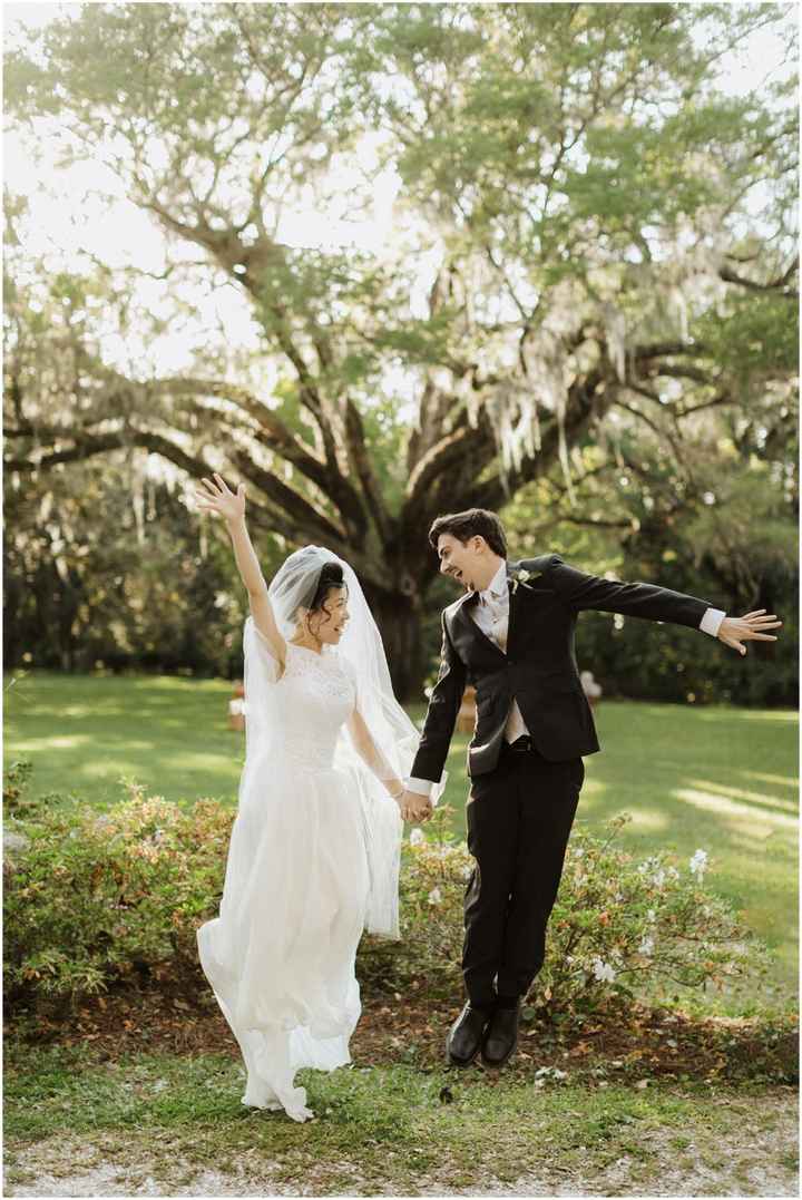 couple jumping for joy, groom and bride jumping