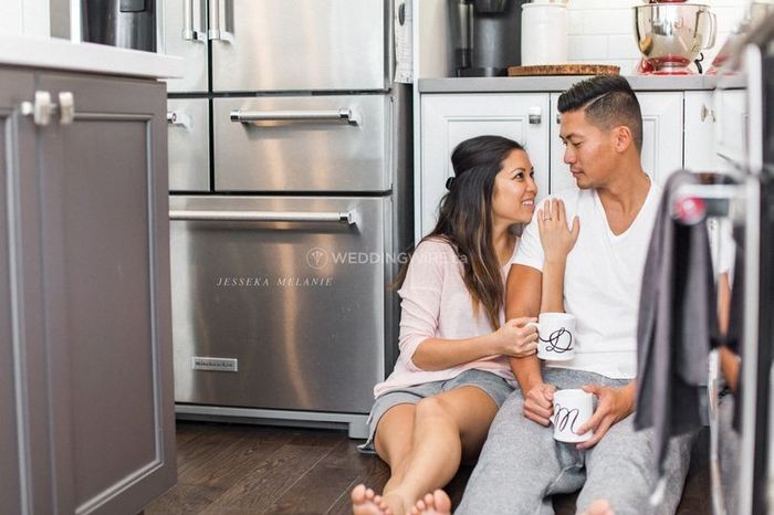 couple sitting on kitchen floor, at home engagement shoot