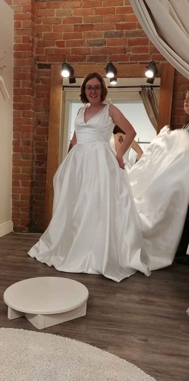 It had pockets!!!! But it was so heavy and doesn't match our rustic venue.