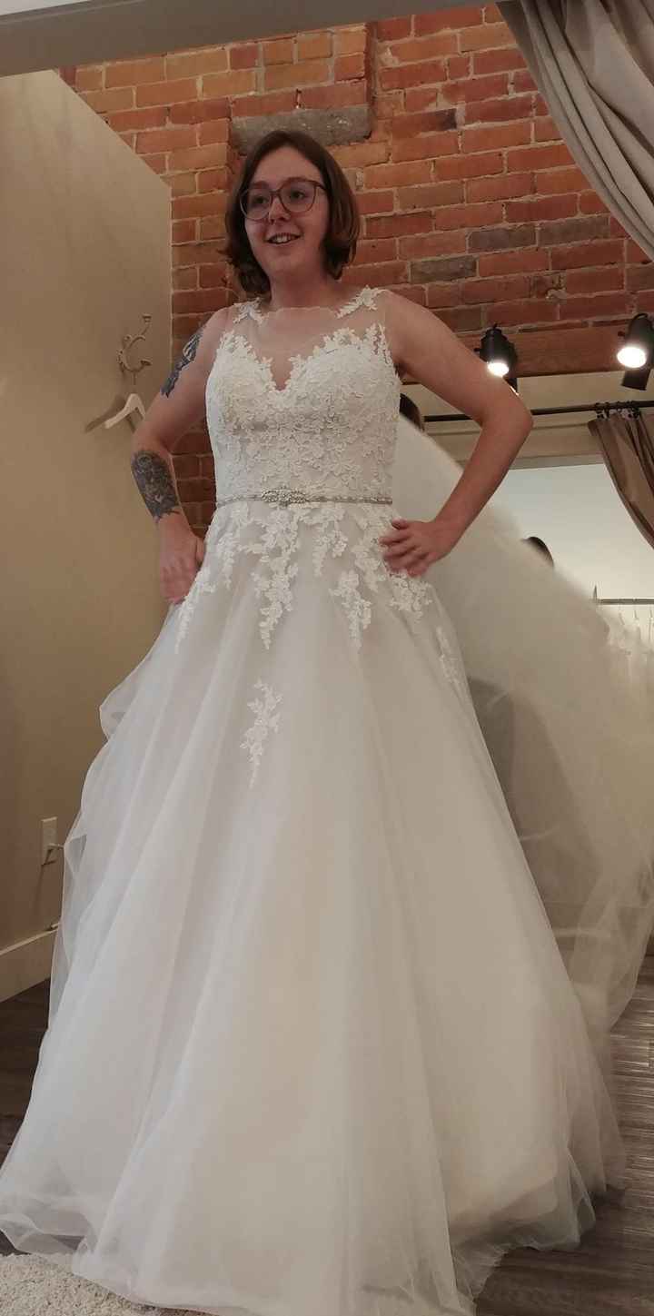 First one I tried on. I liked the floral lace going down, but I didn't like that the belt was attach
