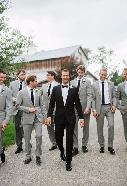Black tux and grey suits