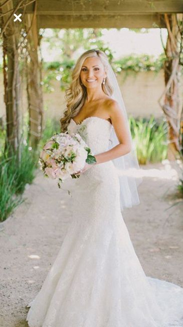 How does your veil attach to your hair? - 1