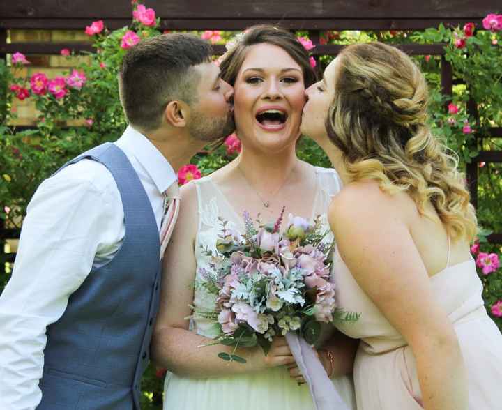 Groom and me kissing the bride