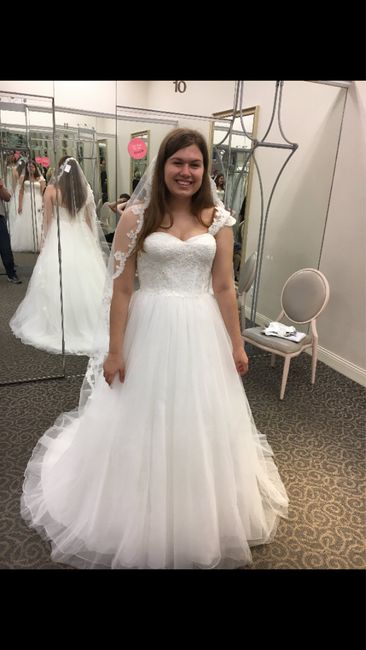 What was the first wedding outfit you tried on? 6