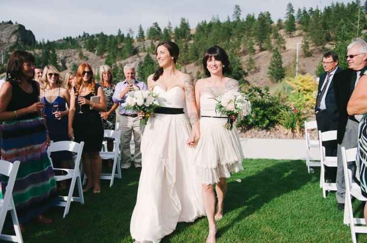 Double the brides = double the bouquets to hold!