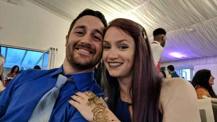 Here's us at rehearsal dinner we went to last summer 