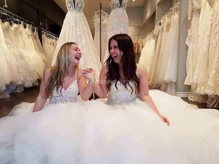 trying on gowns