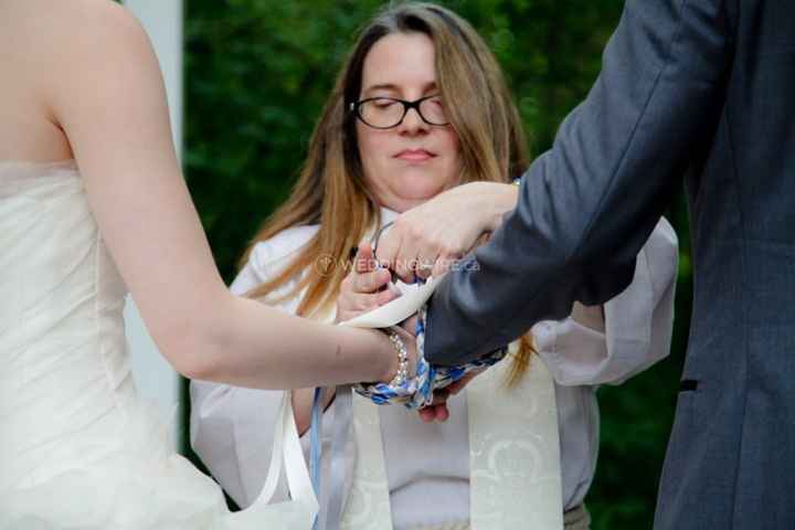 officiant performing a handfasting ceremony