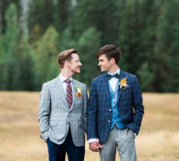 grooms holding hands