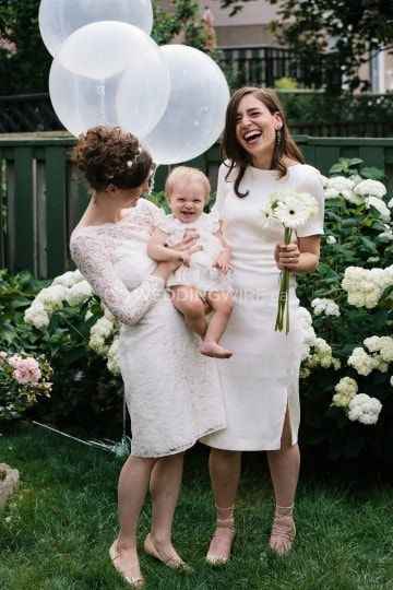 two brides and a baby
