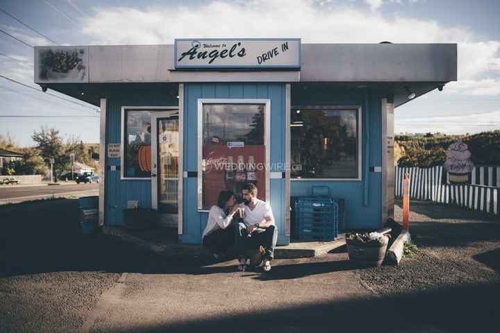 couple in front of a little drive in